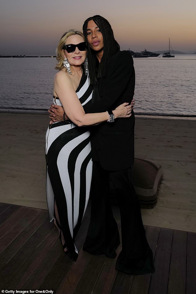 The Glamorous star was also photographed hugging famous French designer Olivier Rousteing, as the pair posed behind a stunning sunset.