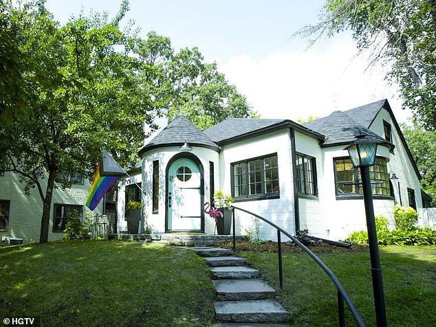 The front of the house was redesigned to replace the bold colors with a more muted finish.