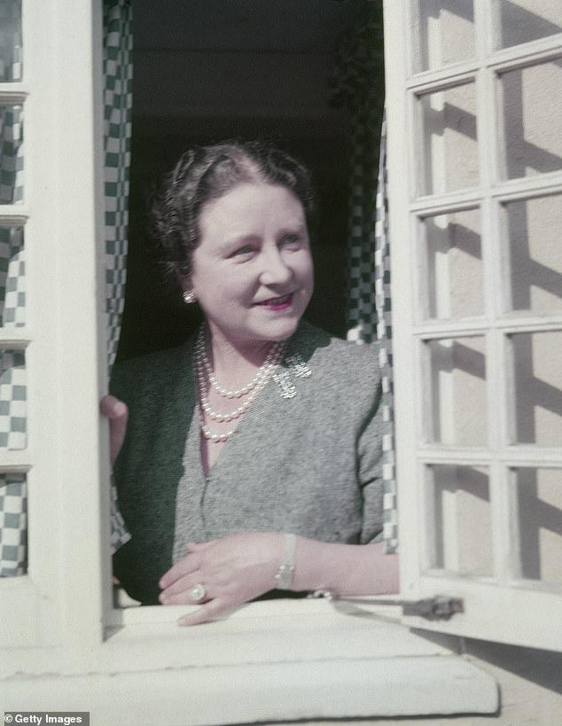 The Queen Mother in a window of the small Welsh house in the grounds of the Royal Lodge