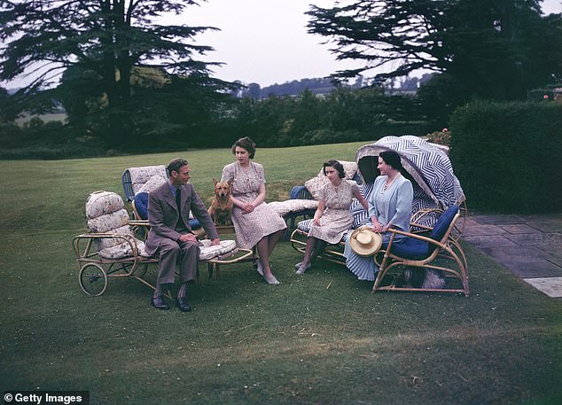 The Queen Mother concentrated on the 30 acres surrounding the Royal Lodge that she preferred to call her personal garden, installing paths lined with hedges, trees and beautiful flower beds. Above: King George VI, Queen Elizabeth and her daughters, Princess Elizabeth and Princess Margaret, sitting in the garden of the Royal Lodge, 1946