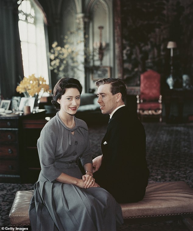 Princess Margaret and Anthony Armstrong-Jones pose inside the Royal Lodge after the announcement of their engagement, February 27, 1960.