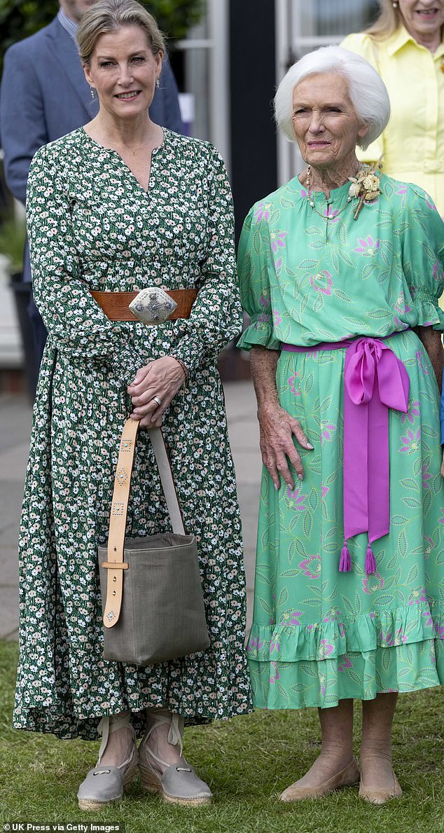 Another famous face at the event was Dame Mary Berry (pictured, right) who posed for a photo with the Duchess (pictured, left).