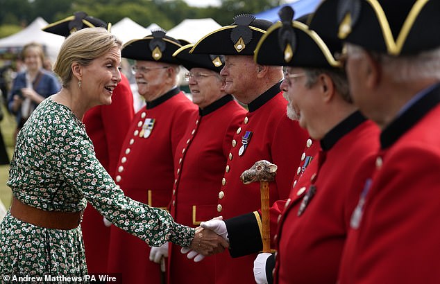 The Duchess of Edinburgh (pictured, left) meets Chelsea pensioners, chats and shakes their hands.