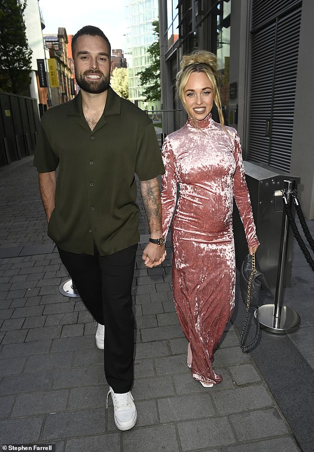 The Hollyoaks actress, 36, looked radiant as she wowed in a baby pink velvet long-sleeved dress, while Olly kept cool in a khaki green short-sleeved shirt, black trousers and white sneakers.