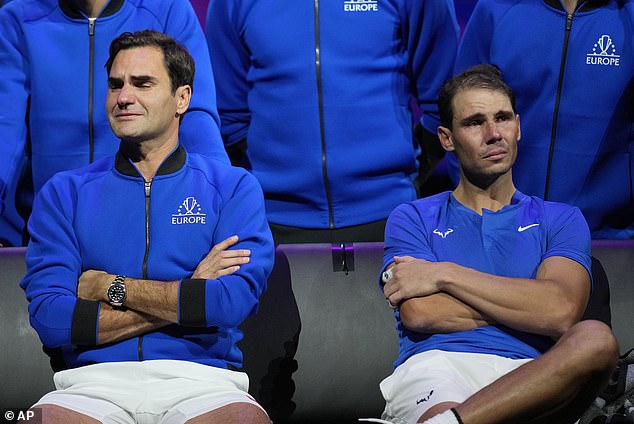 Roger Federer (left) and Rafael Nadal (right) say an emotional farewell after the announcement that the doubles match would be the last of Federer's career.