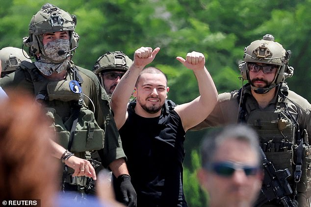 Rescued hostage Almog Meir Jan reacts after escaping alive from the central Gaza Strip after being rescued by soldiers in the mission on Saturday.