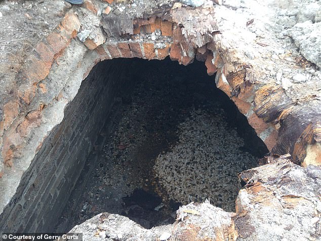 The walls of the tunnel are built with several layers of brick.