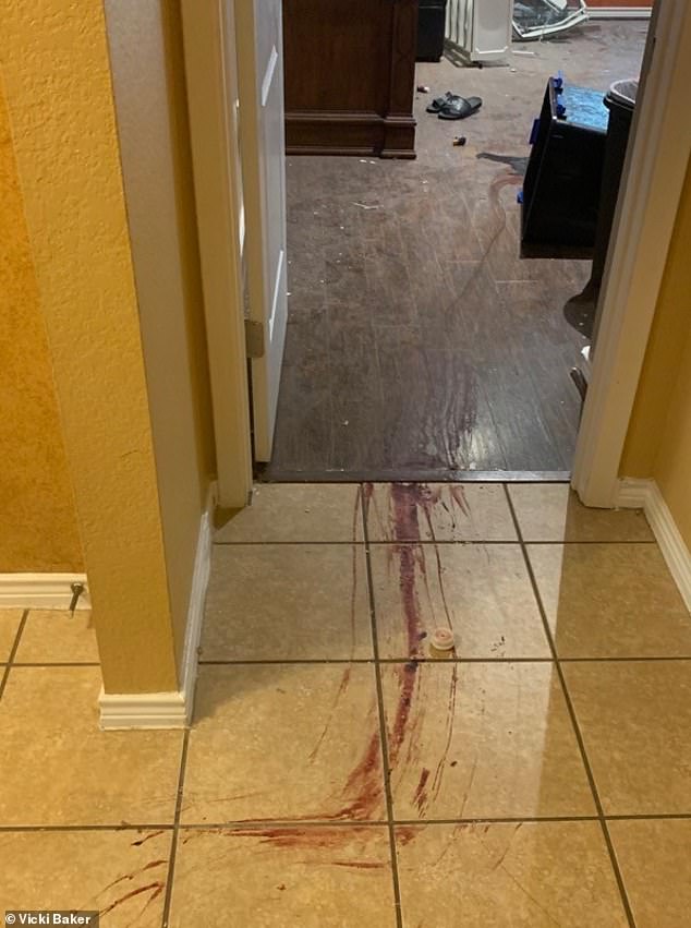 Grim images of Baker's home after July 2020 raid show blood-stained hallways