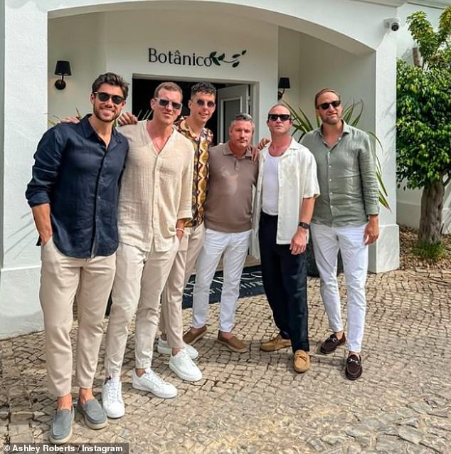 Many of Ryan's male friends attended the party (Ashley's partner Tommy seen far left)