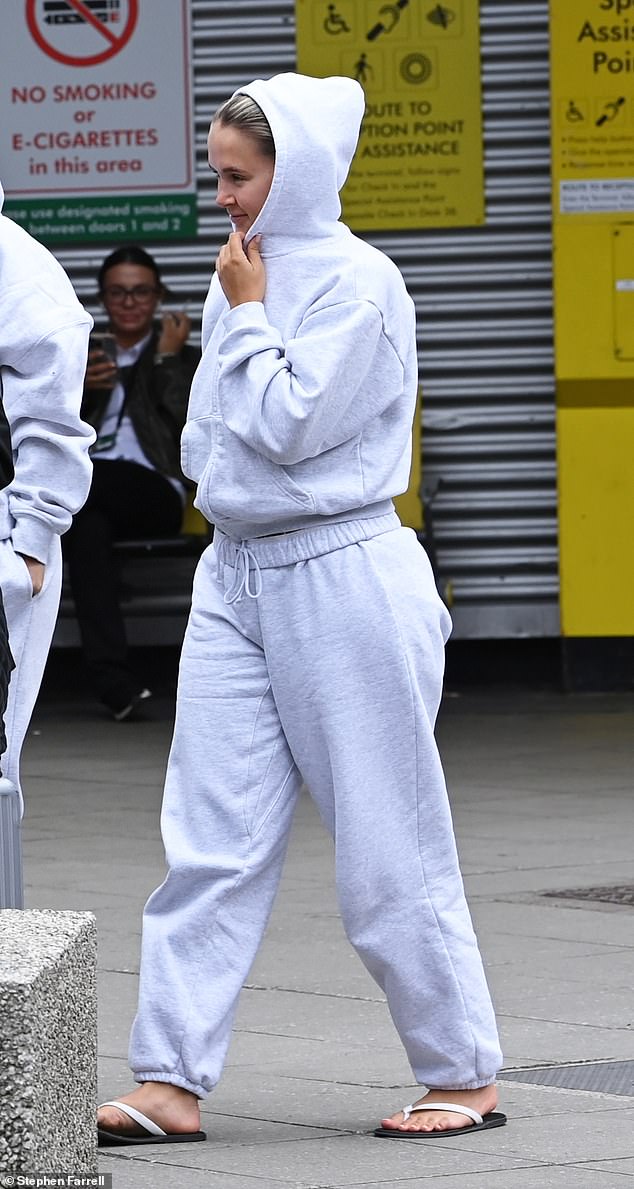 The mother-of-one cut a casual figure in a gray jogging suit when she was spotted in the UK after enjoying a short work trip to Marrakech, Morocco.