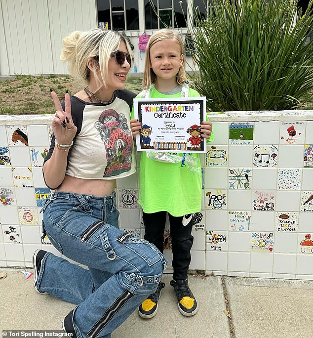 On Saturday, the 51-year-old actress shared photos of her seven-year-old son proudly holding his graduation certificate as they posed outside his elementary school.