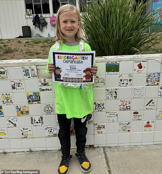 In her caption, she gushed about him moving on to a new grade, writing, 'Beau Beau is officially a first grader!'