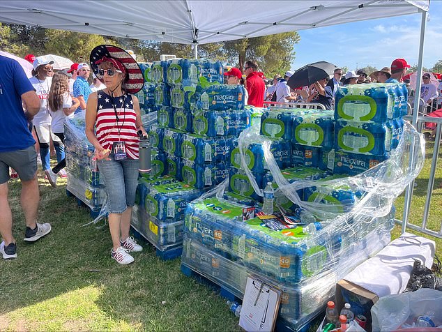 Large cases of water were stacked outside Trump's rally in Las Vegas on Sunday to help people stay hydrated as they waited in line for hours.