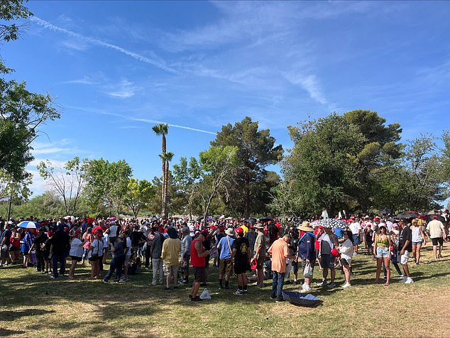 The crowd at Trump's Sunset Park rally circled the pond. The heat in Las Vegas is expected to reach 100 degrees Sunday afternoon. The campaign said it was taking precautions due to extreme weather ahead of the rally.