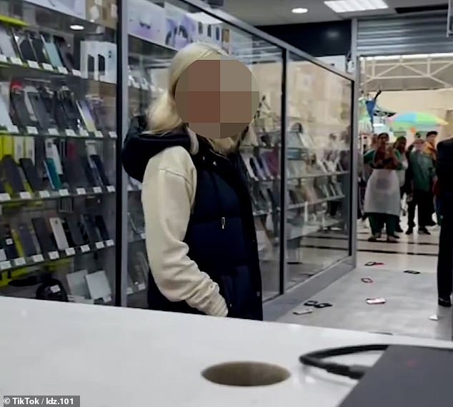 She can be heard telling the worker that she is trashing the store because they 'refused to refund' a phone she bought three months ago.