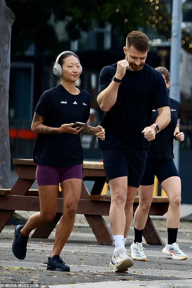 The fitness expert kept his accessories light with a white smartwatch that matched his Nike sneakers and socks.