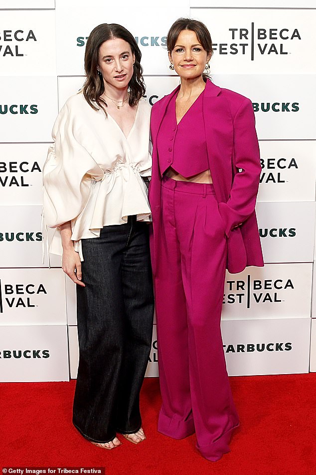 Gugino posed alongside writer-director Laura Kosann, who wore an off-white puffy blouse with dark blue jeans and sandals.