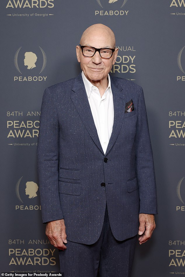 The beloved bald actor also wore thick black-rimmed glasses along with a black pocket square for the evening's festivities.