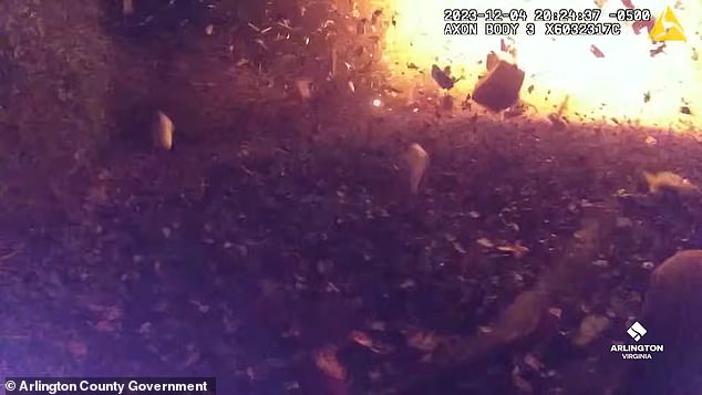 A police officer is seen on body camera being knocked to the ground by the sudden explosion. After shouting some obscenities. The officer turns on his heel and runs away.