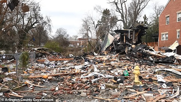 Pictured: The aftermath of the explosion that destroyed Yoo's house.