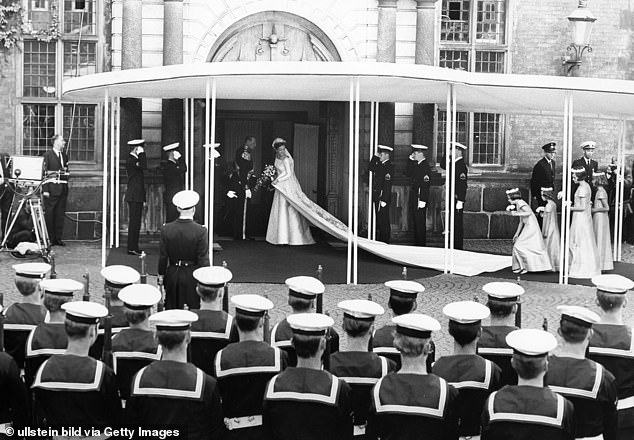 The princess wore an ivory silk dress by Danish couturier Jørgen Bender that featured a six-meter train.