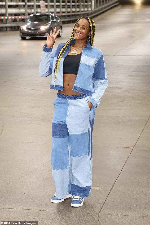 Aaliyah Edwards stunned in a patchwork denim jacket with matching pants and sneakers