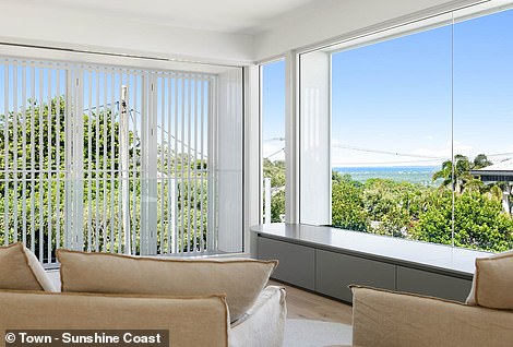 On the second level there is a second family room which opens onto the lounge below and offers panoramic views of the coast to Caloundra and beyond to Moreton Island.