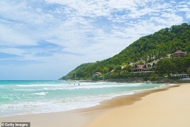 Nai Harn Beach (pictured) reportedly had a yellow flag when the family ran into difficulties in the water, while other nearby beaches were flying a red flag.