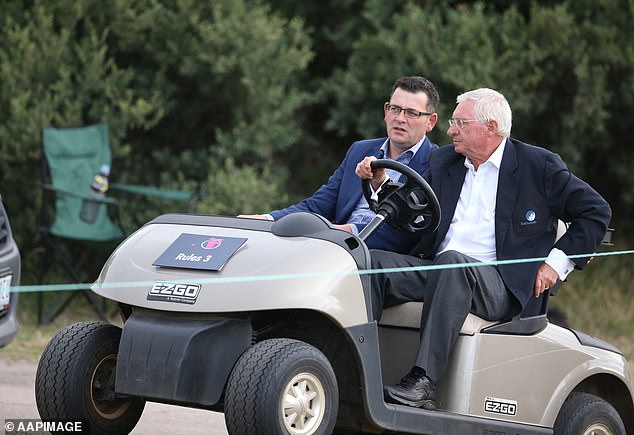 In a letter sent to the committee, more than 100 members, furious at not being able to play a round during the closures, claimed Andrews (pictured with Golf Australia president John Hopkins) 