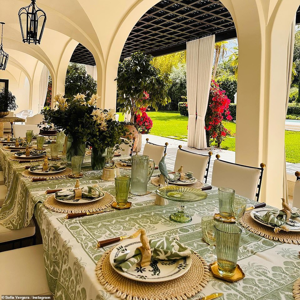 There were white flower arrangements in the center of the table.