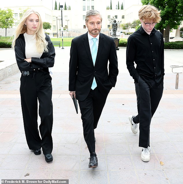 Rebecca Grossman's daughter Alexis, her husband Peter and their son Nick arrived at the Southern California courthouse dressed all in black ahead of the jet-setting killer's sentencing on Monday.