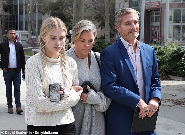 Dr. Peter Grossman (right), his daughter Alexis, 19, left, and son Nick continued to support the socialite and appeared in court to receive her sentence on Monday. They are photographed in February.