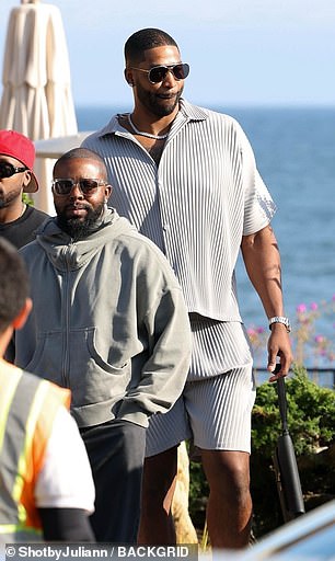 NBA star Tristan, 33, wore a striped T-shirt and shorts for the lunch date.