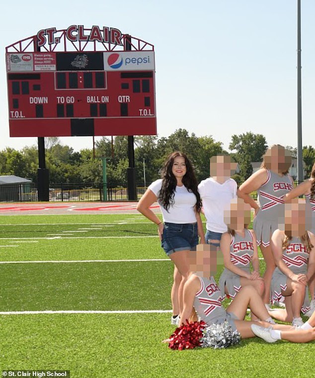 Pictured: Gaiter with the St. Clair High School cheer team, whom he used to coach before his Only Fans scandal.