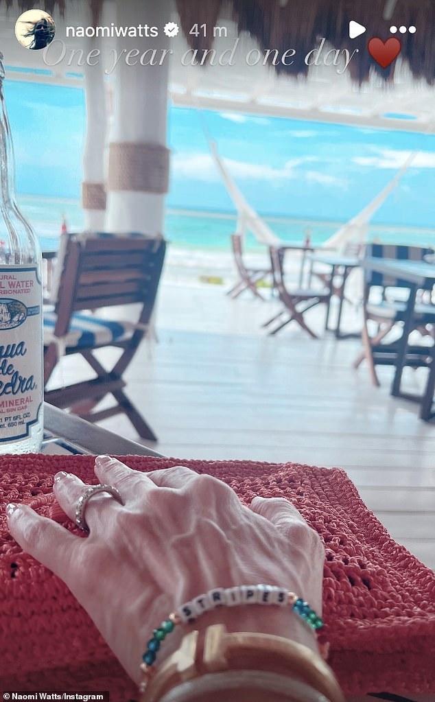 The Watcher star posted an image on Instagram on Tuesday of her hand resting on her designer bag while relaxing on the beach. Naomi was wearing the round diamond wedding ring and several bracelets on her hand.