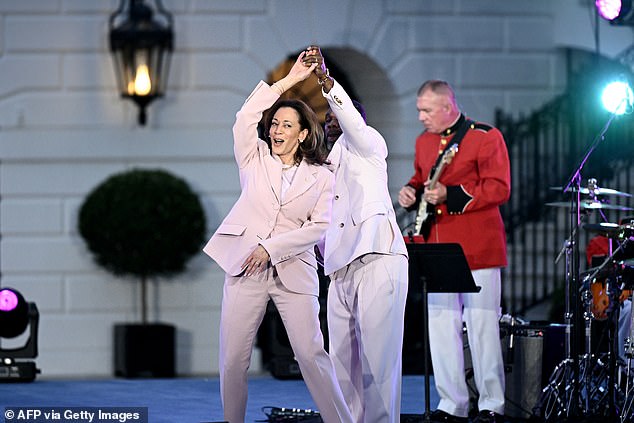 US Vice President Kamala Harris dances with US singer Kirk Franklin during a June 16 concert on the South Lawn of the White House in Washington, DC, June 10, 2024.