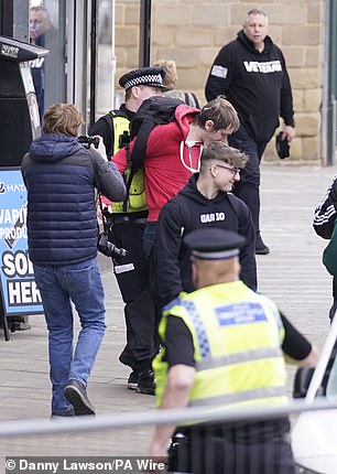 He is then taken away by police following the shocking incident in South Yorkshire this morning.