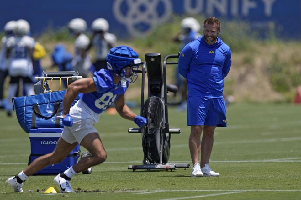 Rams wide receiver JJ Laap goes through a drill as head coach Sean McVay watches during a practice at Cal Lutheran.