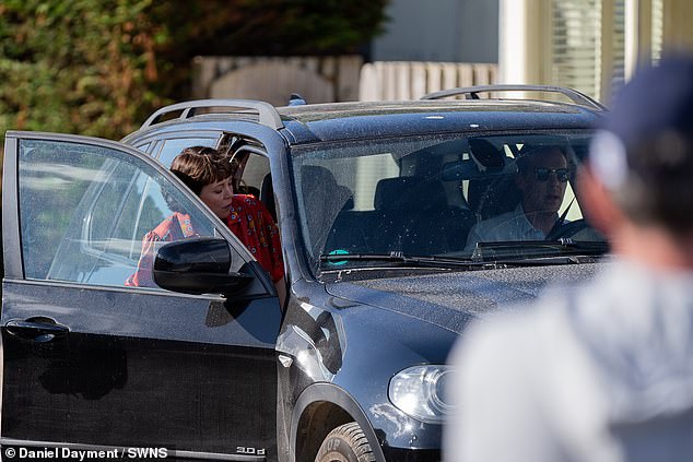 Benedict was sad outside the seafood bistro while Olivia was seen fleeing the establishment and getting into a dirty BMW.