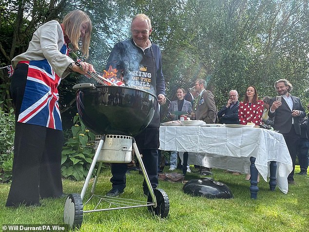 The leader of the Liberal Democrats flipping burgers in a back garden on the general election campaign in Wiltshire