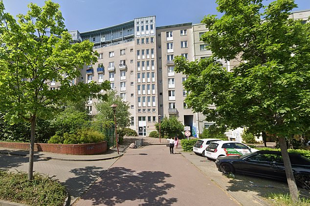 Police were alerted to the incident at an apartment building (pictured) in Berlin's Altglienicke district at around 1pm on Monday.