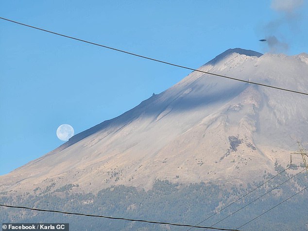 Luis Guerra, a resident of the city of Atlixco, in central Mexico, photographed this image of an apparent UFO over the Popocatépetl volcano in Mexico. Sightings near this and other volcanoes have fueled speculation that the UFOs could come from a hidden underground base.