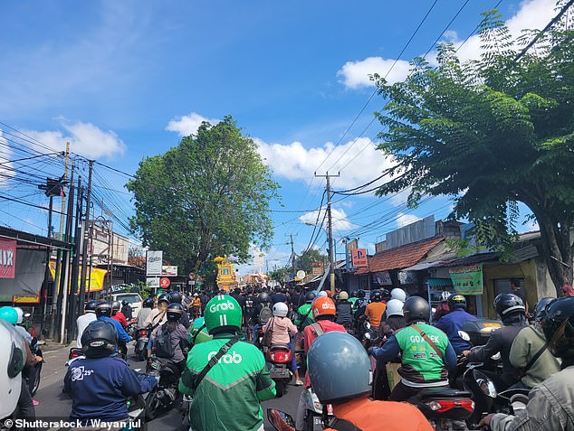 Riding a scooter or motorcycle in Bali can be chaotic and tourists are advised to be careful and always wear a helmet.