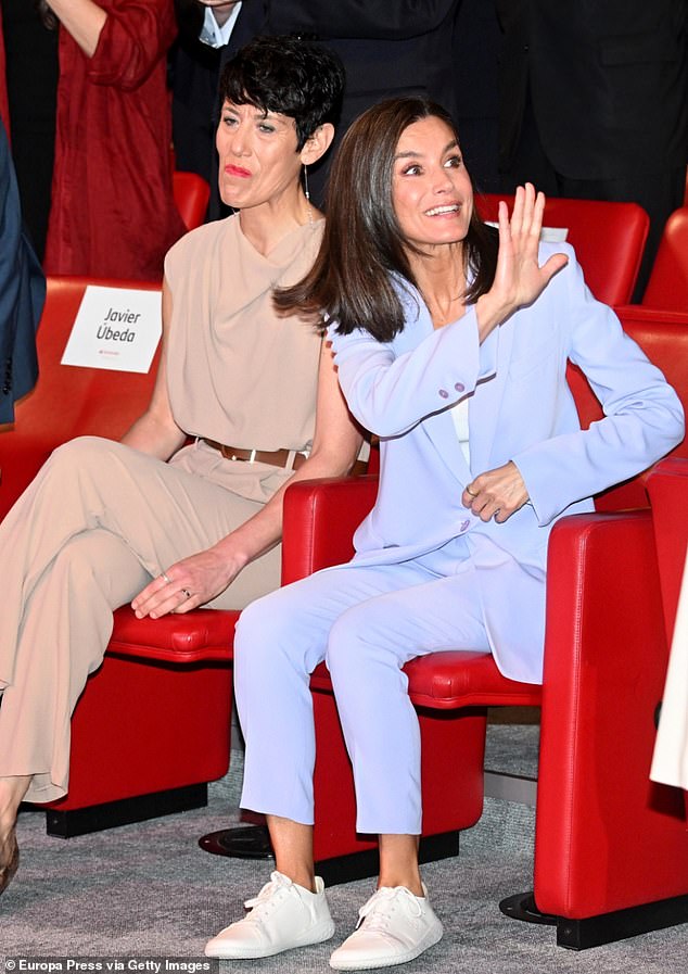 Letizia wore her signature glossy brunette locks in a sleek straight hairstyle and opted for glamorous makeup, complete with smoky eyes and pink lip gloss.