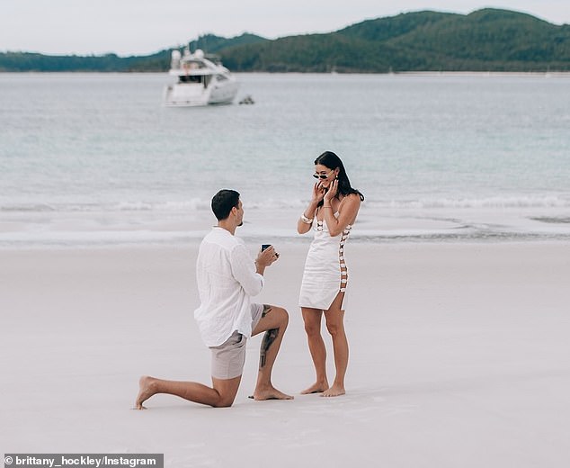 Another frame appears to capture the moment Benjamin got down on one knee and proposed to the reality TV star turned podcaster.