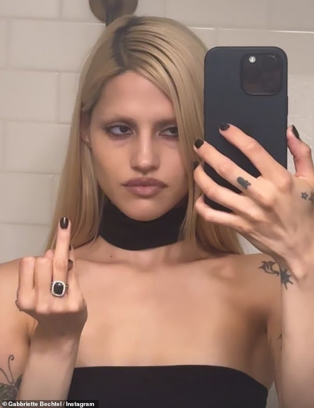 Gabbriette continued to show off her engagement ring and then shared a mirror selfie, but switched it to her right hand.