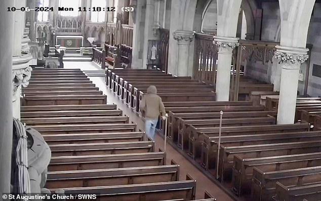 CCTV captures thief stealing Victorian brass eagle lectern from St Augustine's Church in Edgbaston.