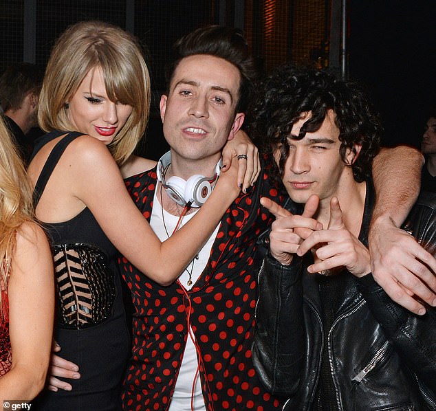 Taylor Swift (left) was first linked to the 1975 frontman (right) in 2014 and later in 2023, but they reportedly split after a month of dating (Nick Grimshaw pictured center).