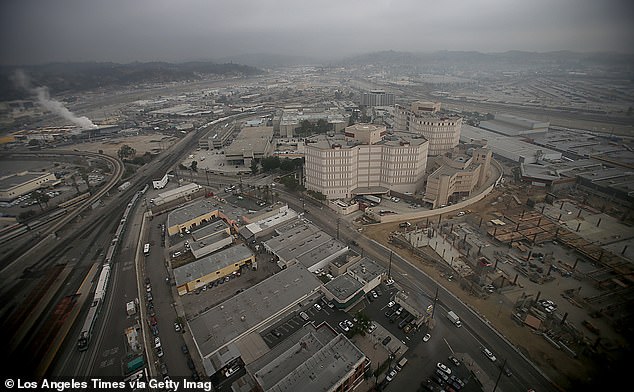 The Los Angeles River flows behind the Twin Towers Jail, downtown, as seen from the MTA building in downtown Los Angeles.