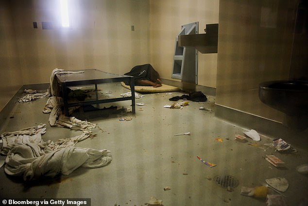 An inmate with mental health issues sleeps on the floor in the Forensic Inpatient Unit, part of the Correctional Treatment Center Hospital, at the Los Angeles County Sheriff's Department's Twin Towers Correctional Facility in Los Angeles, California, USA. USA, September 23, 2014.